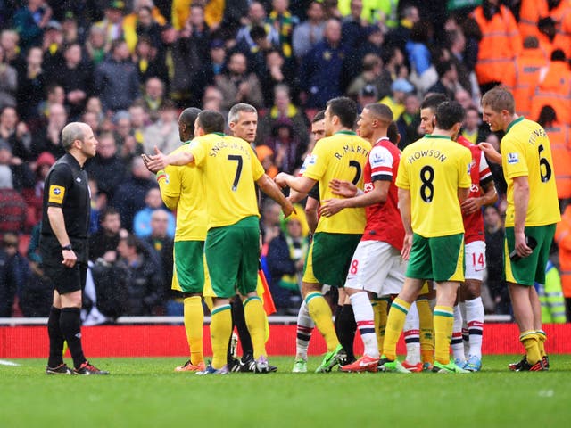 Norwich players are furious after the final whistle at Arsenal