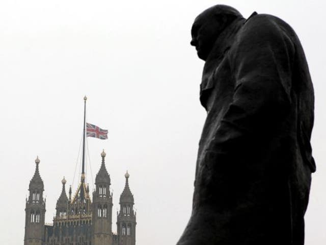 The statue of Winston Churchill in front of the Houses of Parliament as the Union flag flew at half mast after Baroness Thatcher's death. The bells of Big Ben and the Great Clock at Westminster will be silenced during her funeral for the first time since 