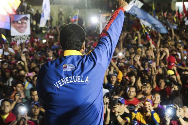 Nicolas Maduro gives a victory speech in Caracas early yesterday