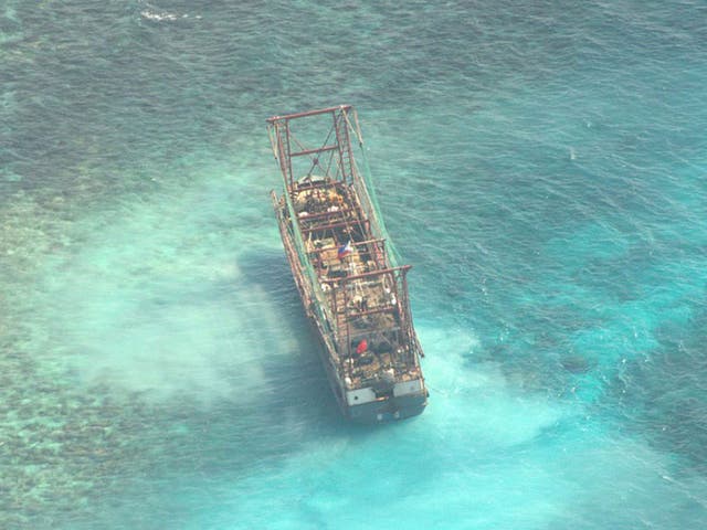The Chinese boat, Min Long Yu, at the Tubbataha Reef area off the coast of Palawan province, Western Philippines. 12 crew members ran it aground on 08 April at a northern islet of the Tubbataha Marine National Park off Palawan province.