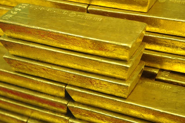 <p>A stack of gold bars </p>