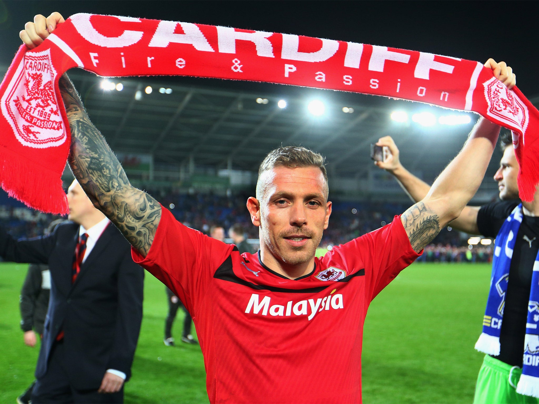 Craig Bellamy celebrates Cardiff's promotion to the Premier League