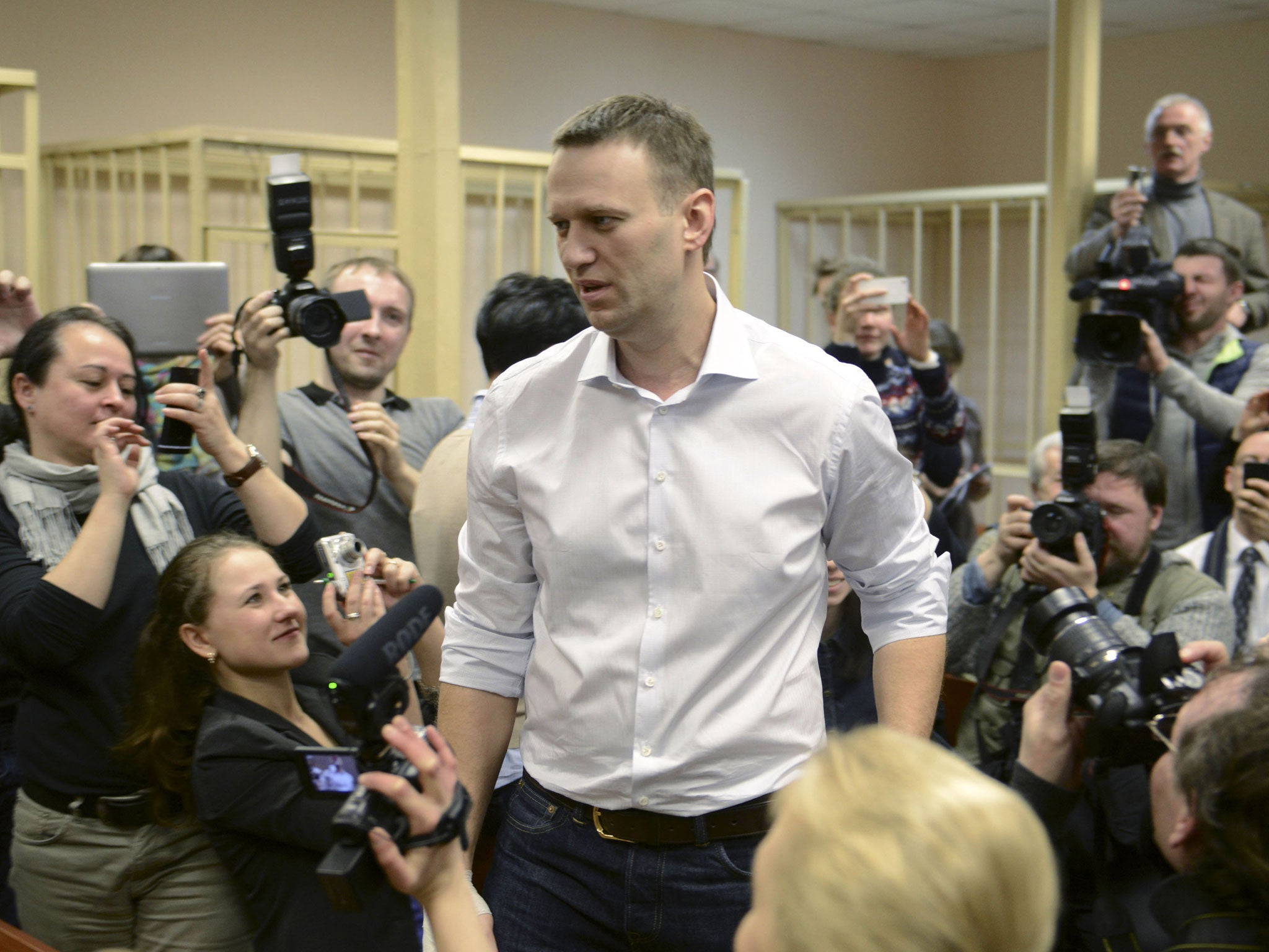 Alexei Navalny enters the courtroom in Kirov