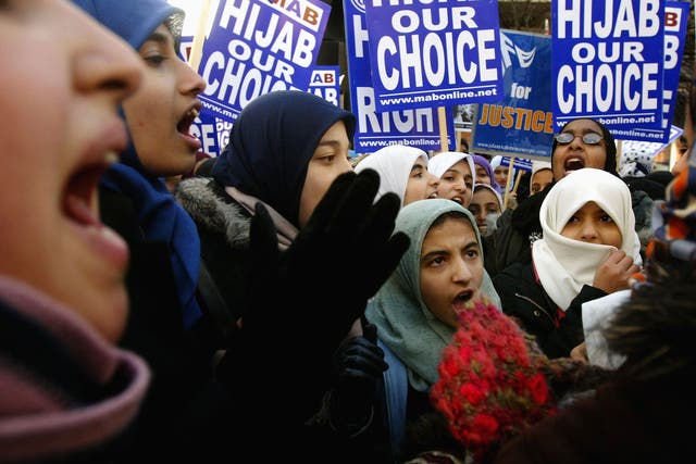 A group of Muslim women demonstrate outside the French Embassy on January 17, 2003 in London.