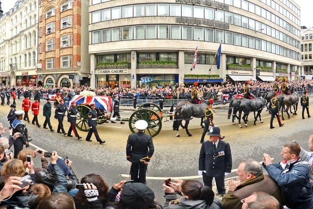 The coffin of Baroness Thatcher is brought up Ludgate Hill