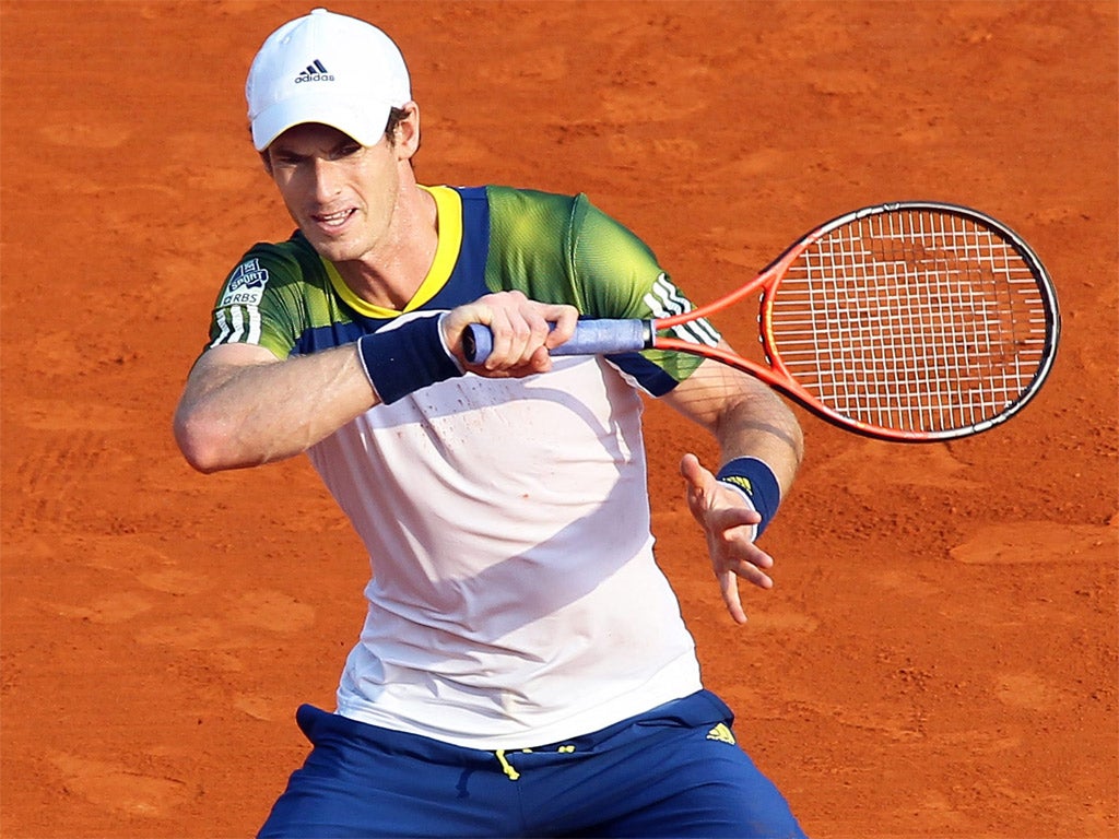 Andy Murray hits a return during his straight-sets win over Edouard Roger- Vasselin in Monte Carlo