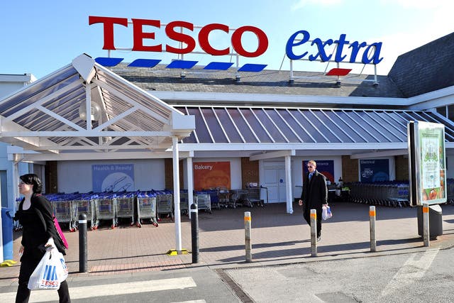 Checkout staff at Tesco have seen their annual shares bonus pot halved