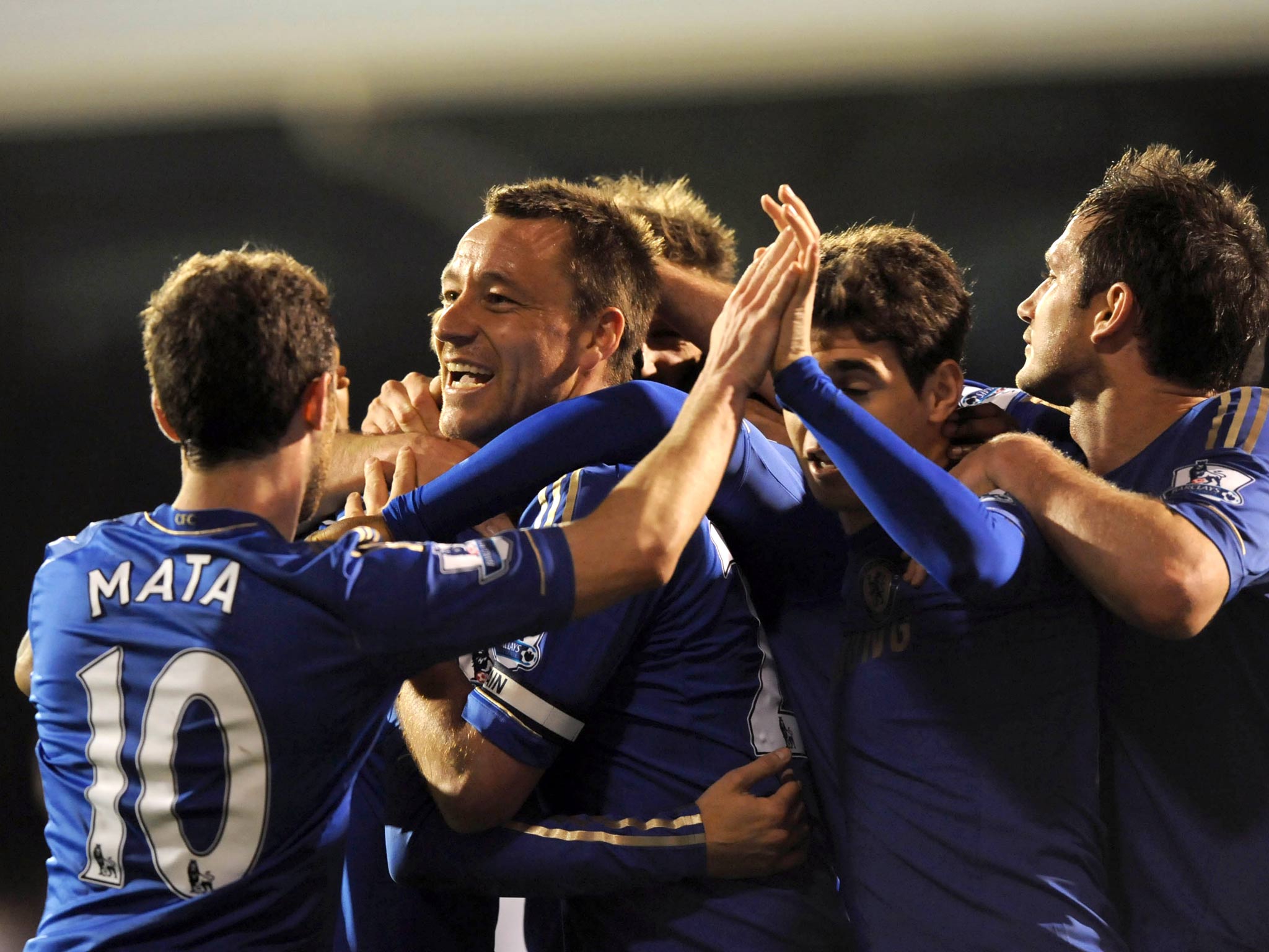 Chelsea captain John Terry celebrates after scoring against Fulham