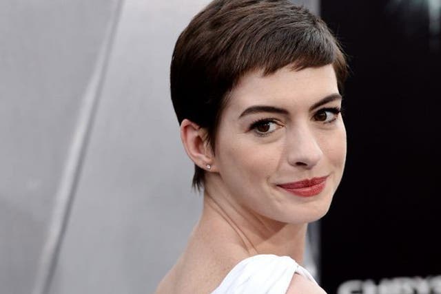 Christopher Nolan's latest movie, Interstellar, is hoping to entice Anne Hathaway (pictured) aboard to star alongside Matthew McConaughey