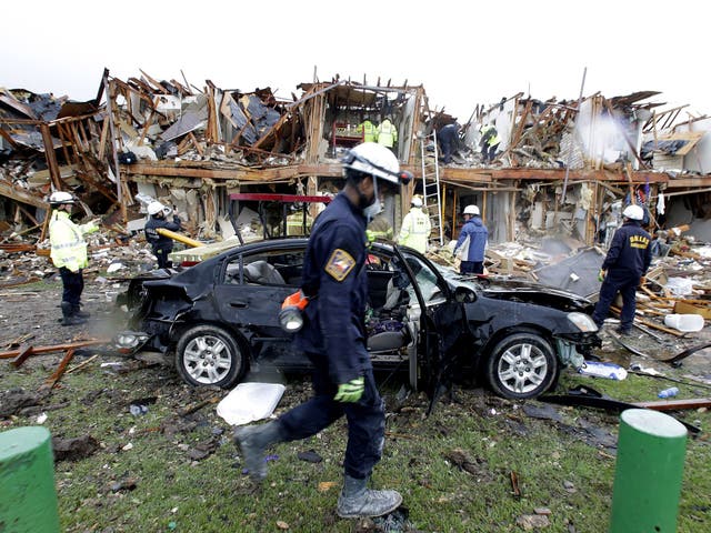 Firefighter conduct search and rescue of an apartment destroyed by the explosion