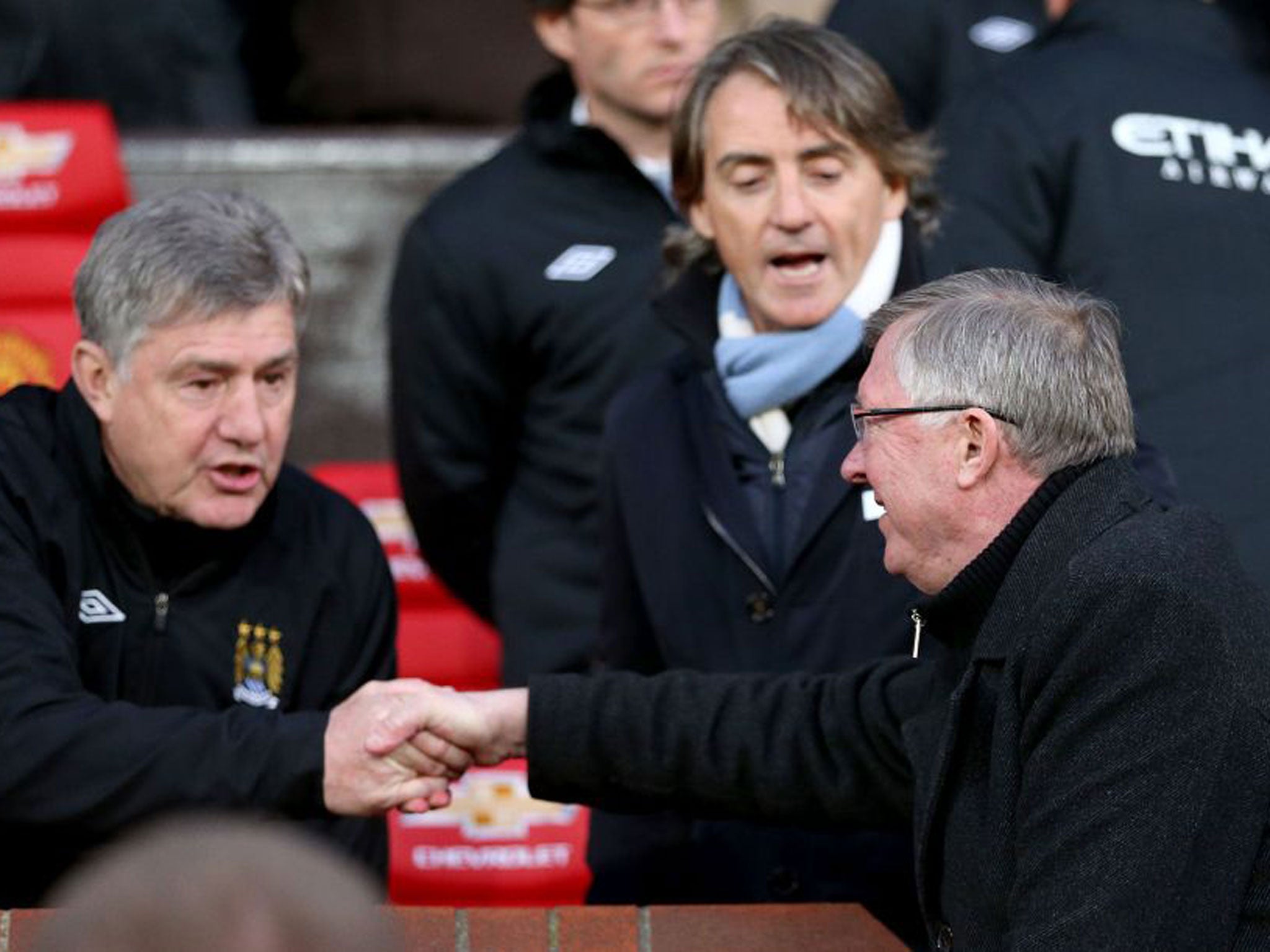 Brian Kidd with Roberto Mancini and Sir Alex Ferguson