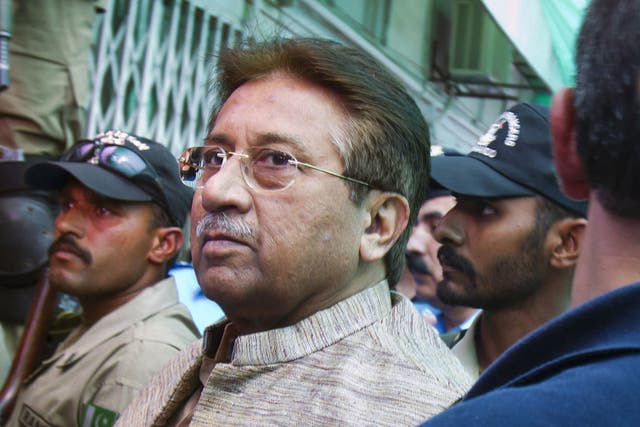 Marked man: Pervez Musharraf arrives at court in Islamabad yesterday