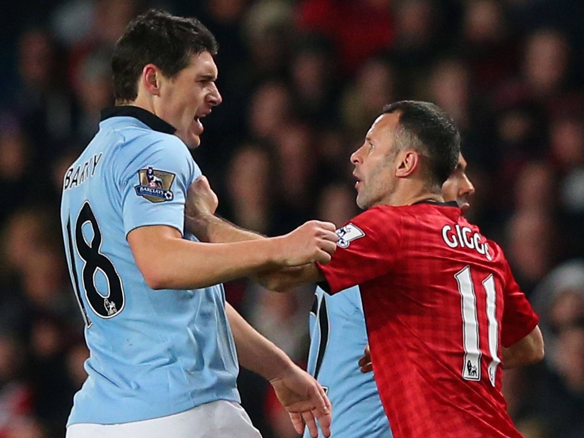 Blue murder: Gareth Barry clashes with Ryan Giggs at Old Trafford; ‘The frustration was certainly there,’ he admits