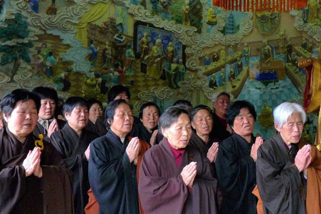 Monks and Buddists singing scriptures