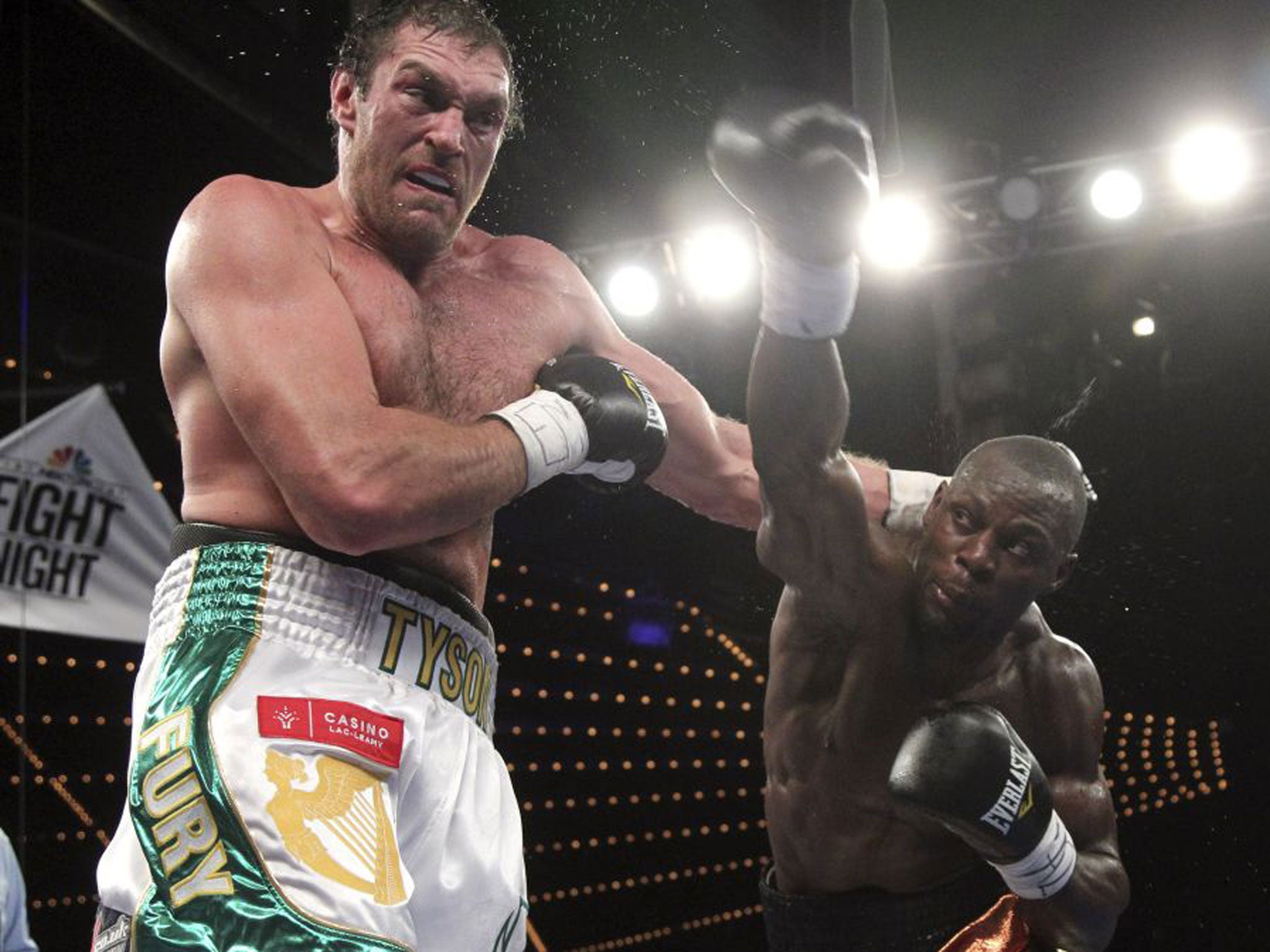 Tyson Fury (left) recovered from a second-round knockdown to beat Steve Cunningham in New York