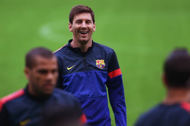 Lionel Messi takes part in a training session ahead of Barcelona's Champions League tie with Bayern Munich
