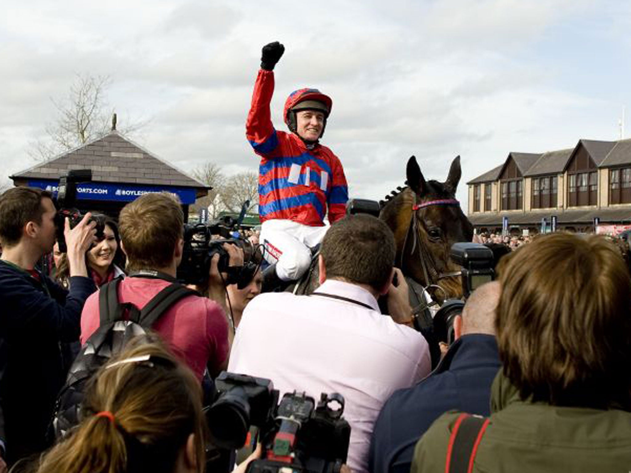 Barry Geraghty on Sprinter Sacre, celebrating his win at The Boylesports.com Champion Chase (Getty)