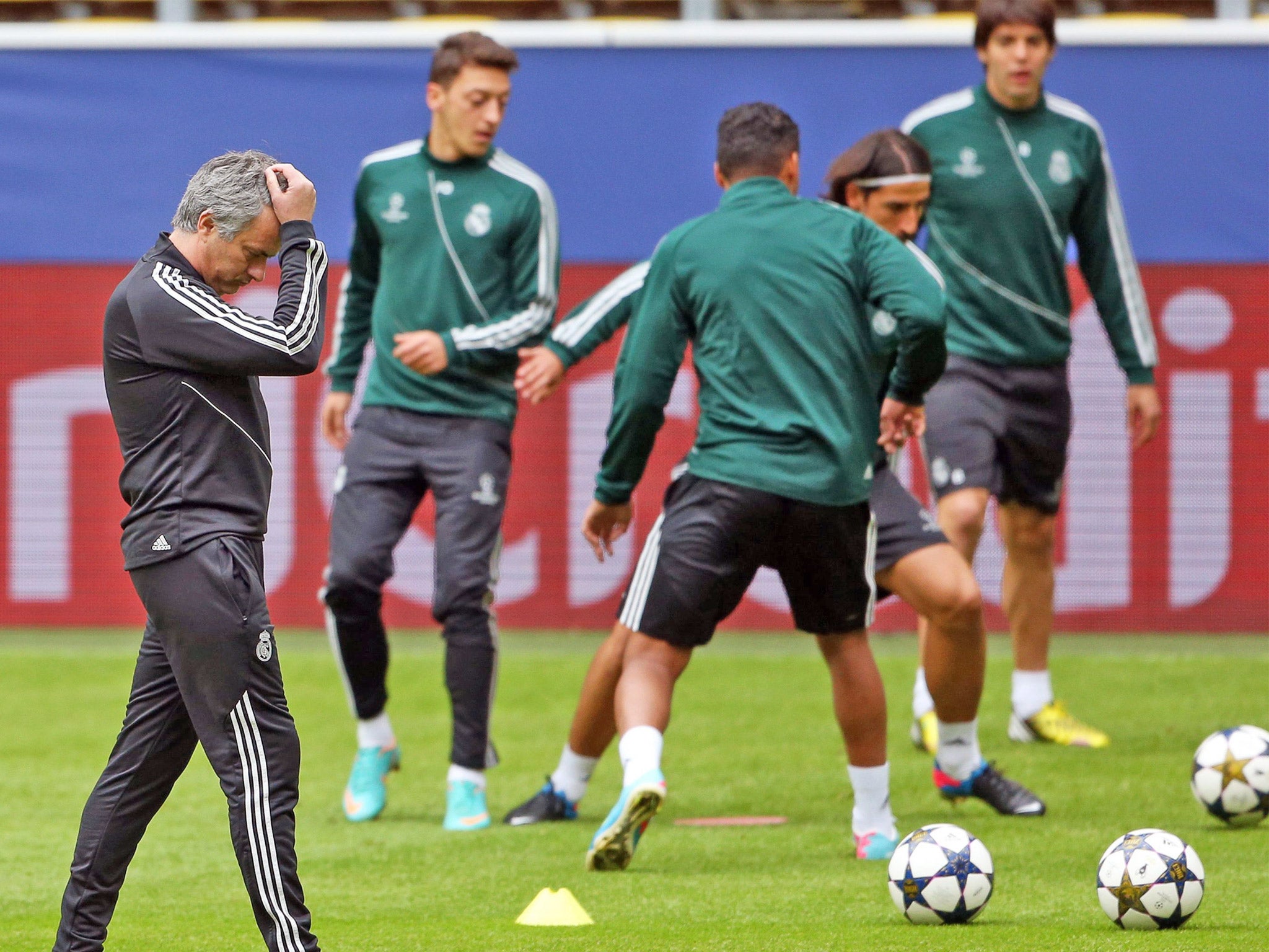 Jose Mourinho deep in thought during training in Dortmund yesterday