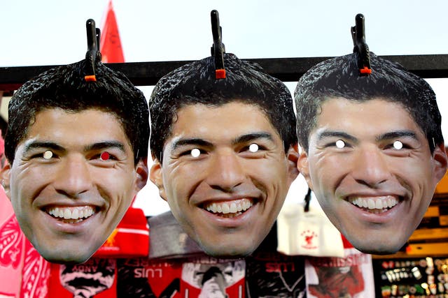 Luis Suarez masks on sale outside Anfield