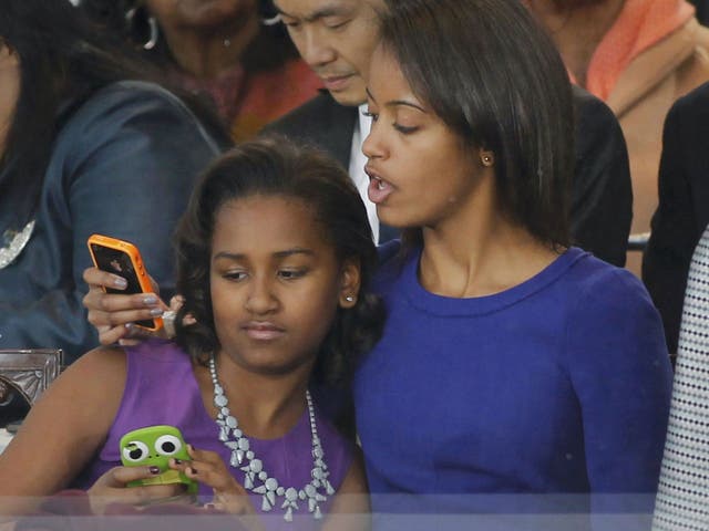 Sasha and Malia Obama have been told that if they get tattoos, their parents will too - in a bid to put them off