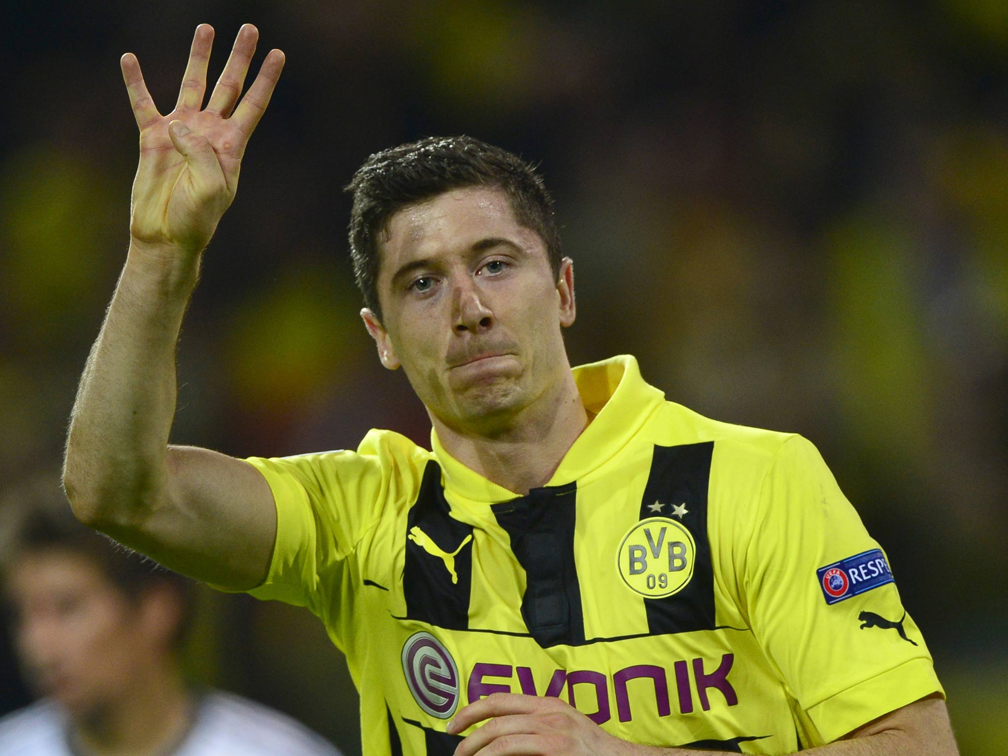 Robert Lewandowski celebrates after putting four goals past Real Madrid