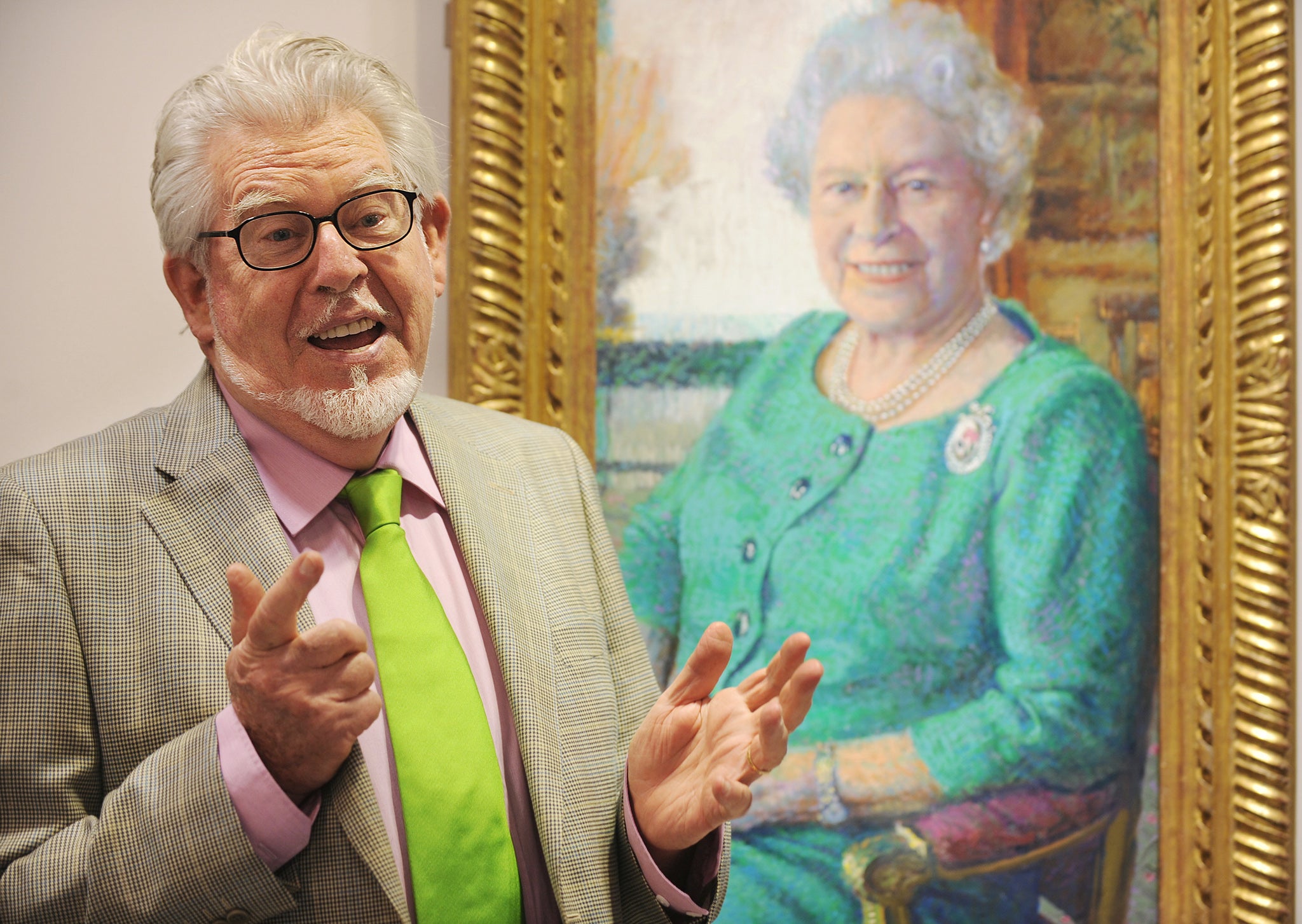 Black paint smeared over art gallery displaying Rolf Harris paintings ...