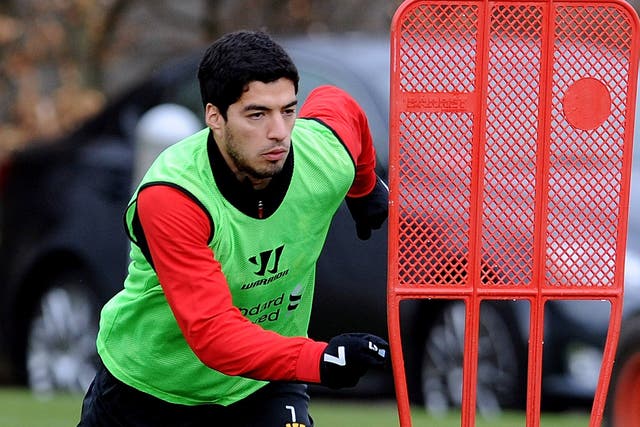 Luis Suarez pictured training with Liverpool today
