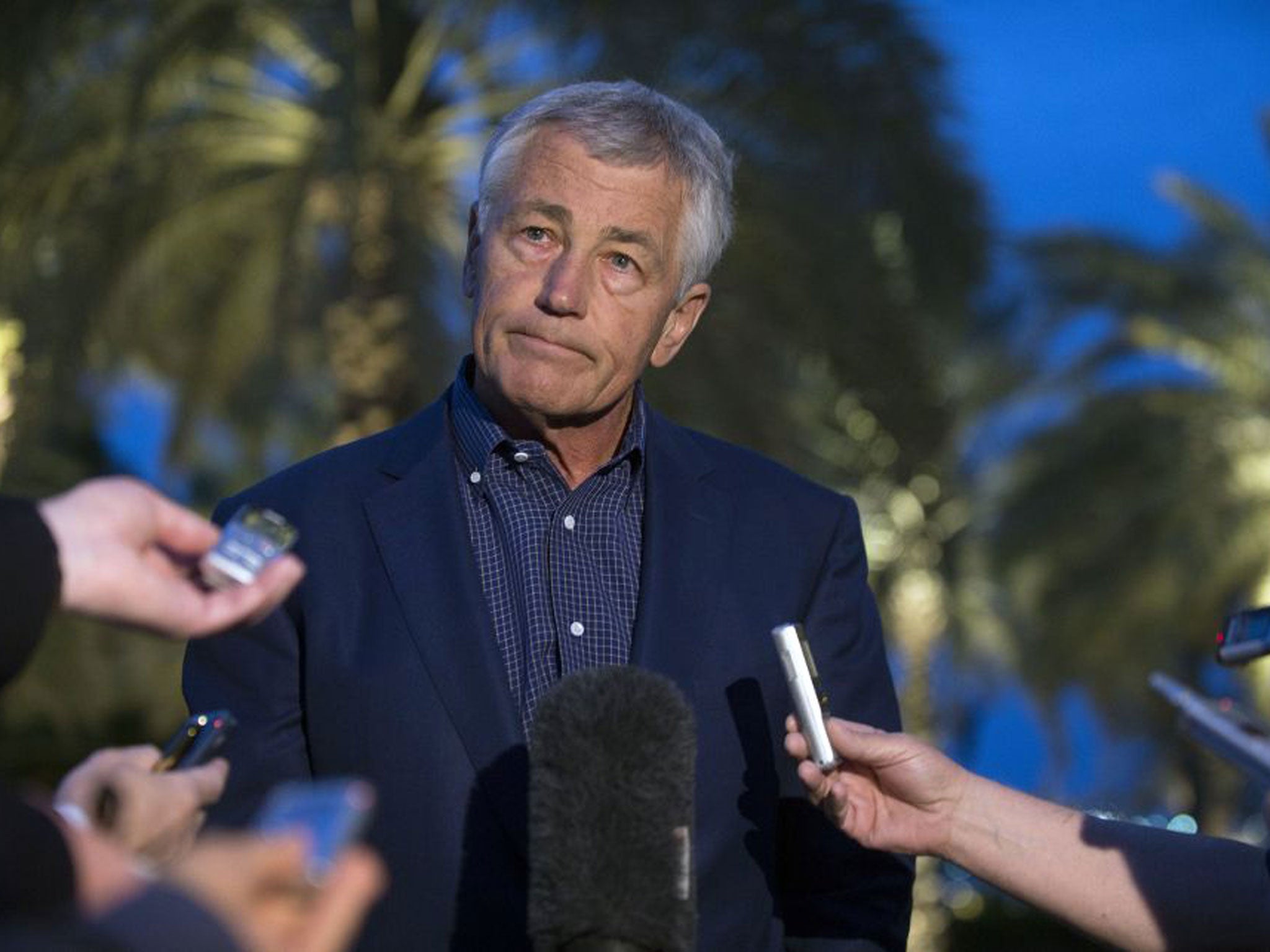 US Secretary of Defense Chuck Hagel speaks with reporters after reading a statement on chemical weapon use in Syria
