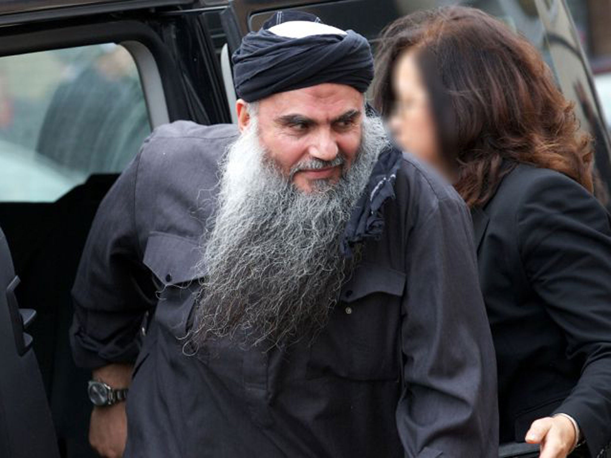 Jordanian terror suspect Abu Qatada arrives at his home in northwest London, after he was released from prison