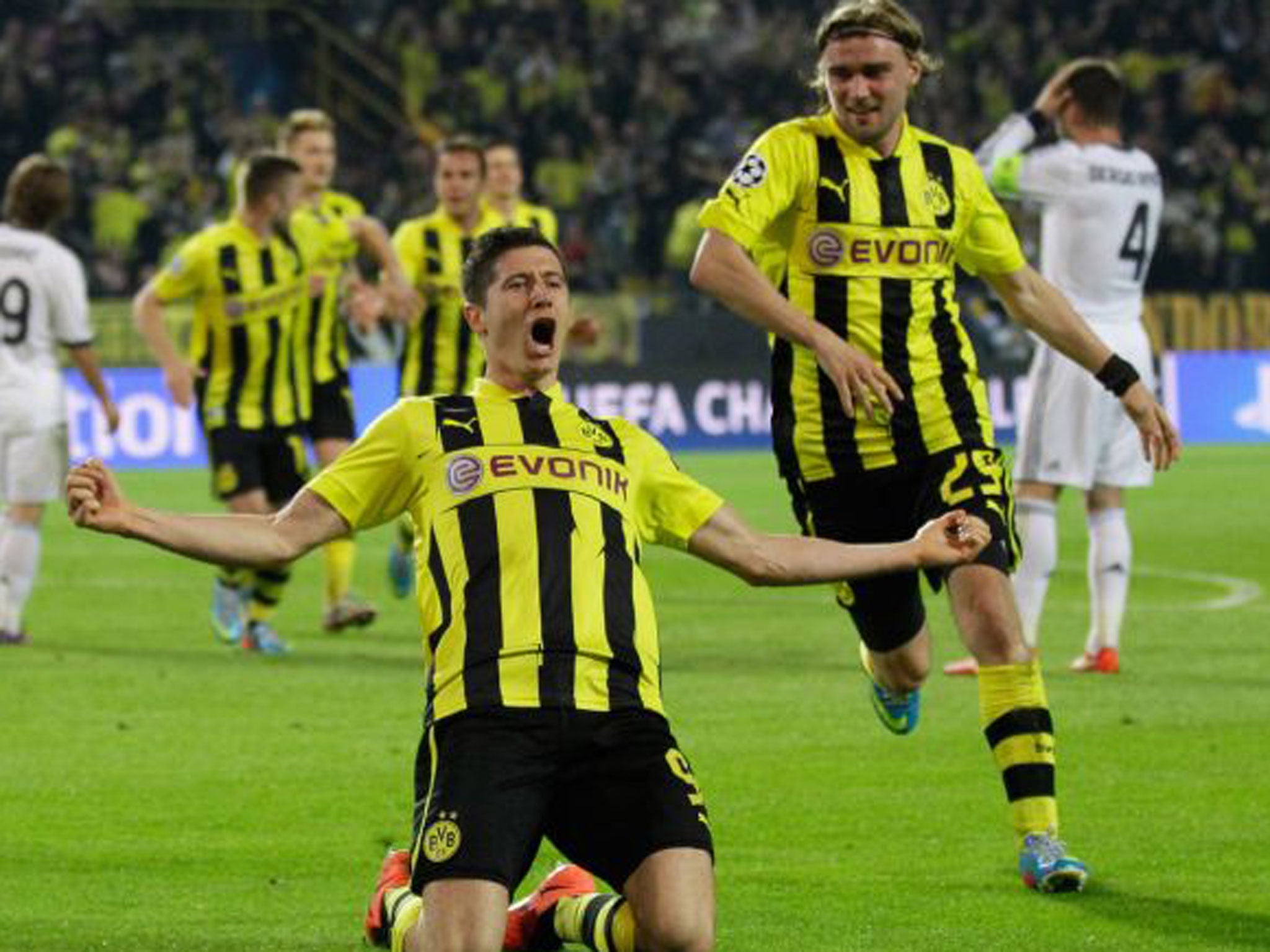Dortmund players celebrate in front of their fans on Wednesday night
