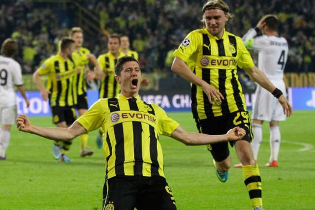 Dortmund players celebrate in front of their fans on Wednesday night