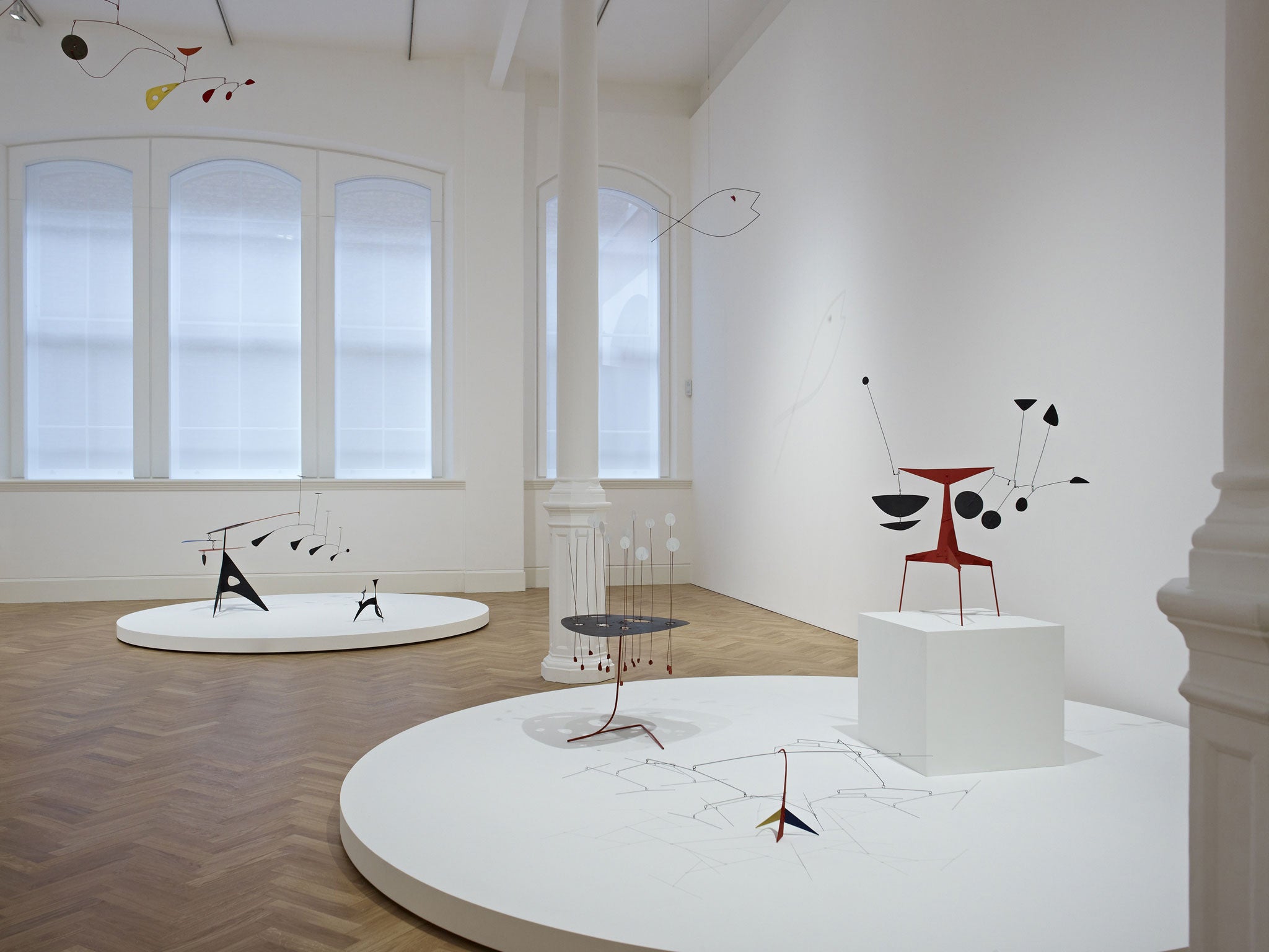 On the move: Calder’s mobiles have slender elements but suggest a bigger space