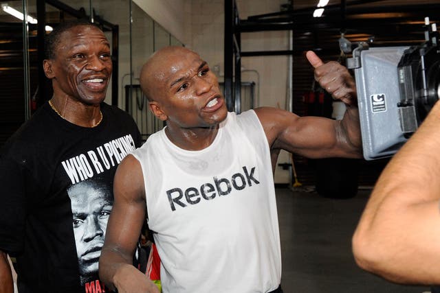 Parental guidance: Floyd Mayweather Jnr with his father Floyd Snr, who returns to his corner for the Guerrero fight