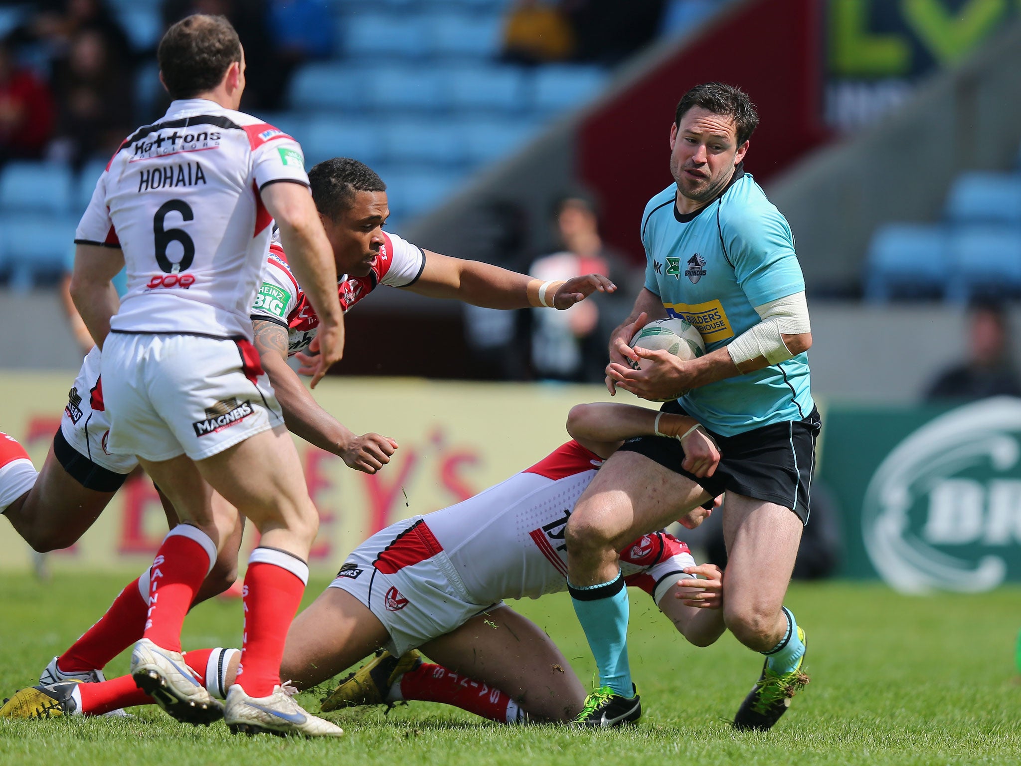 London Broncos' Kieran Dixon (right) scores a try during the