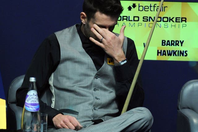 Not sitting pretty: World No 1 Mark Selby contemplates defeat yesterday