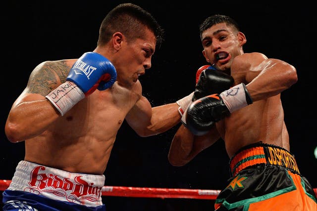 Amir Khan of Great Britain was fighting for survival with Julio Diaz - but eventually won the match