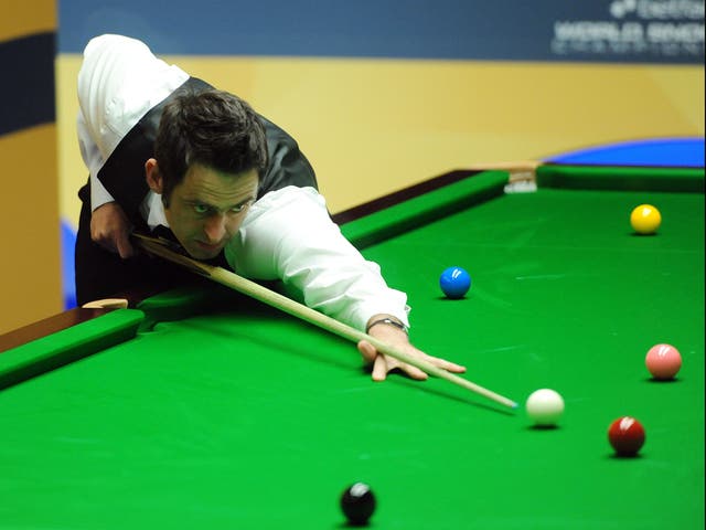 Ronnie O'Sullivan at the table in his second round match against Ali Carter during the Betfair World Championships at the Crucible, Sheffield