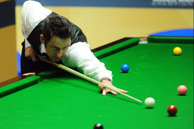 Ronnie O'Sullivan at the table in his second round match against Ali Carter during the Betfair World Championships at the Crucible, Sheffield