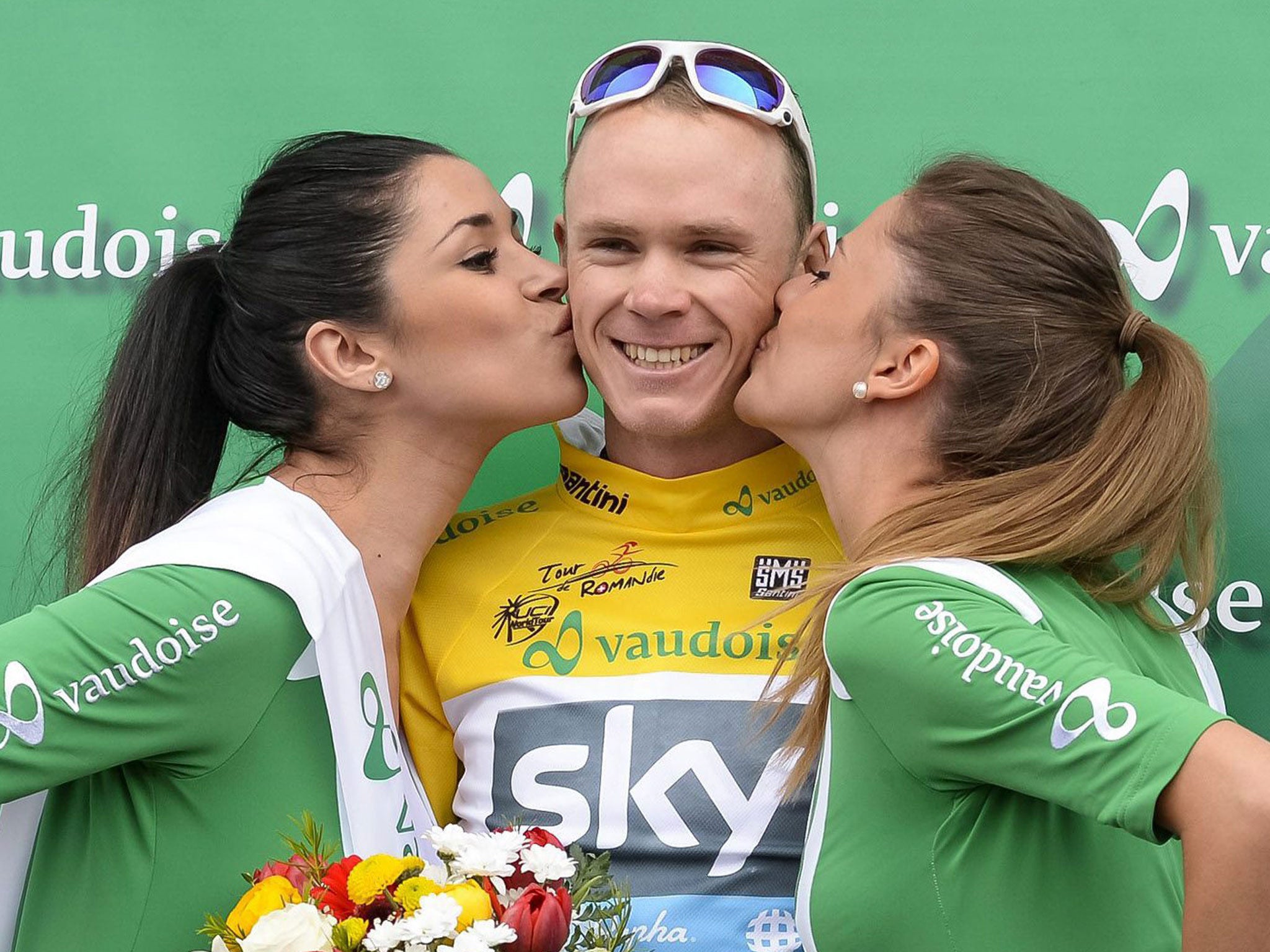 The winner of the 67th Tour de Romandie British Christopher Froome of team Sky Procycling, celebrates on the podium during the 5th and last stage, a 18,7 km race against the clock, at the 67th Tour de Romandie UCI ProTour