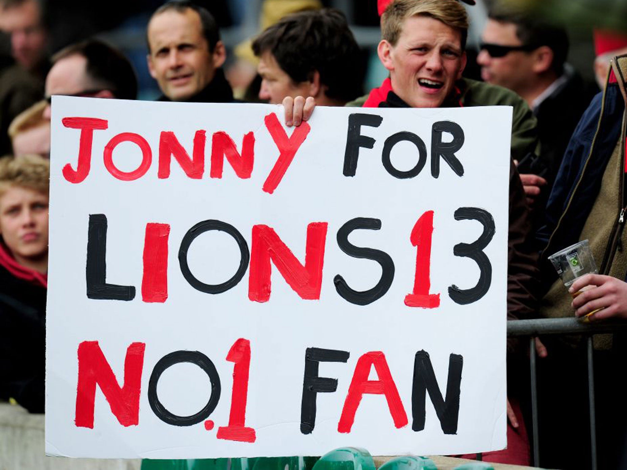 A fan makes his feelings known to the Lions coaches