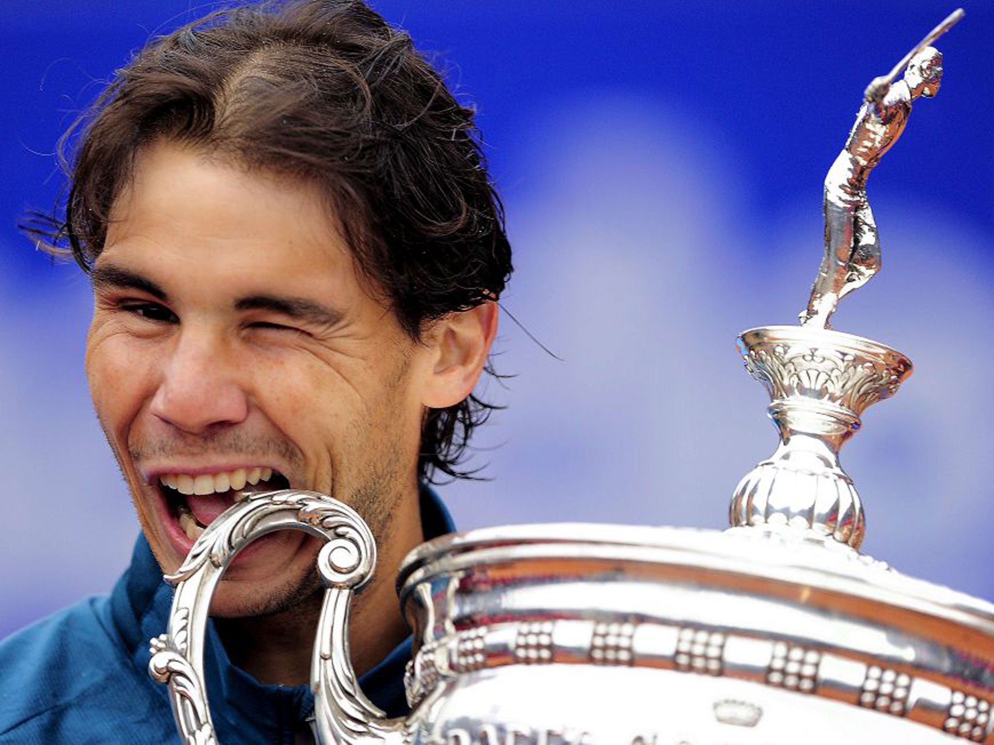 Rafael Nadal celebrates retaining the Barcelona Open trophy