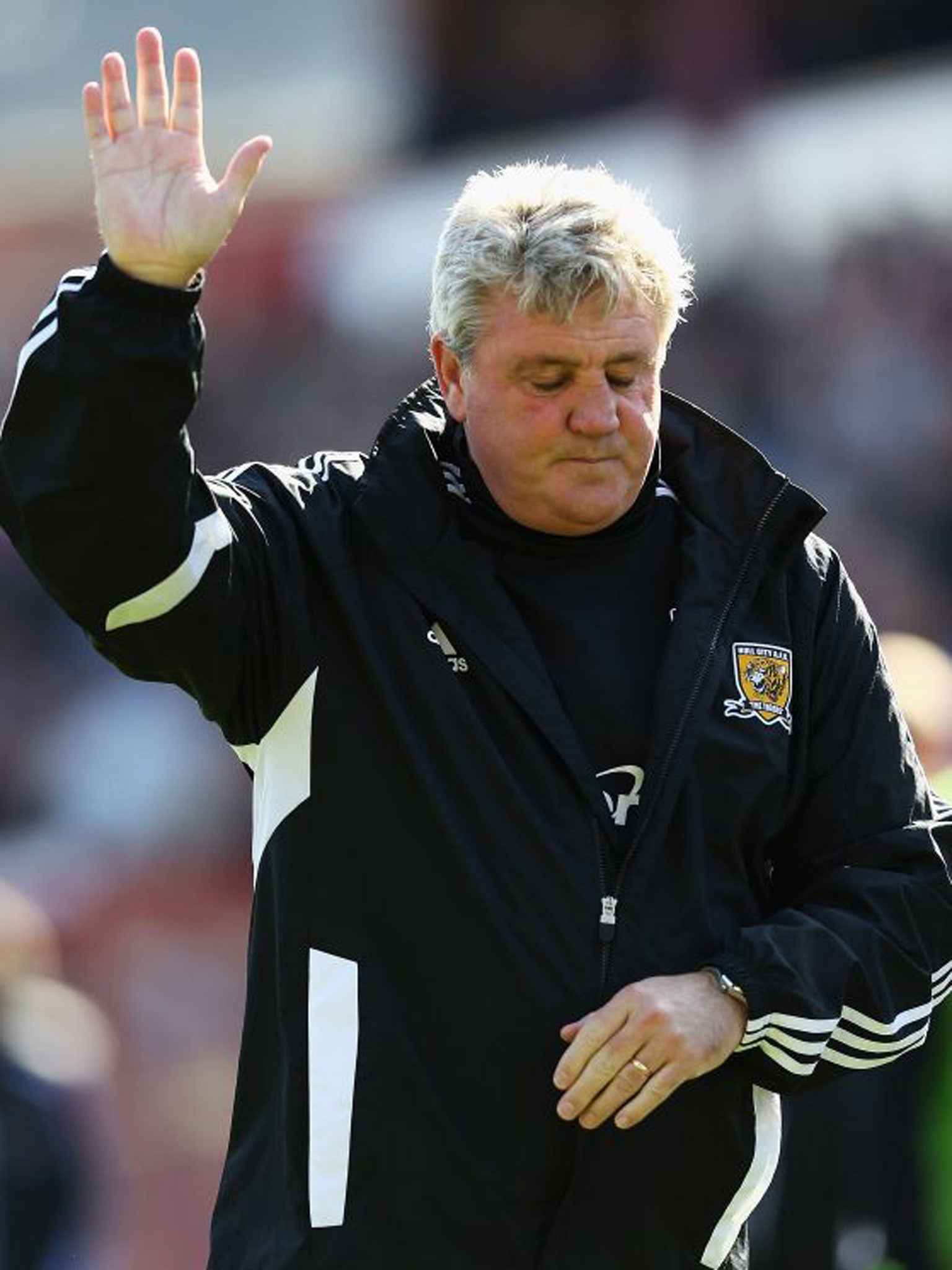 An unhappy Steve Bruce looks on as Hull fall to defeat