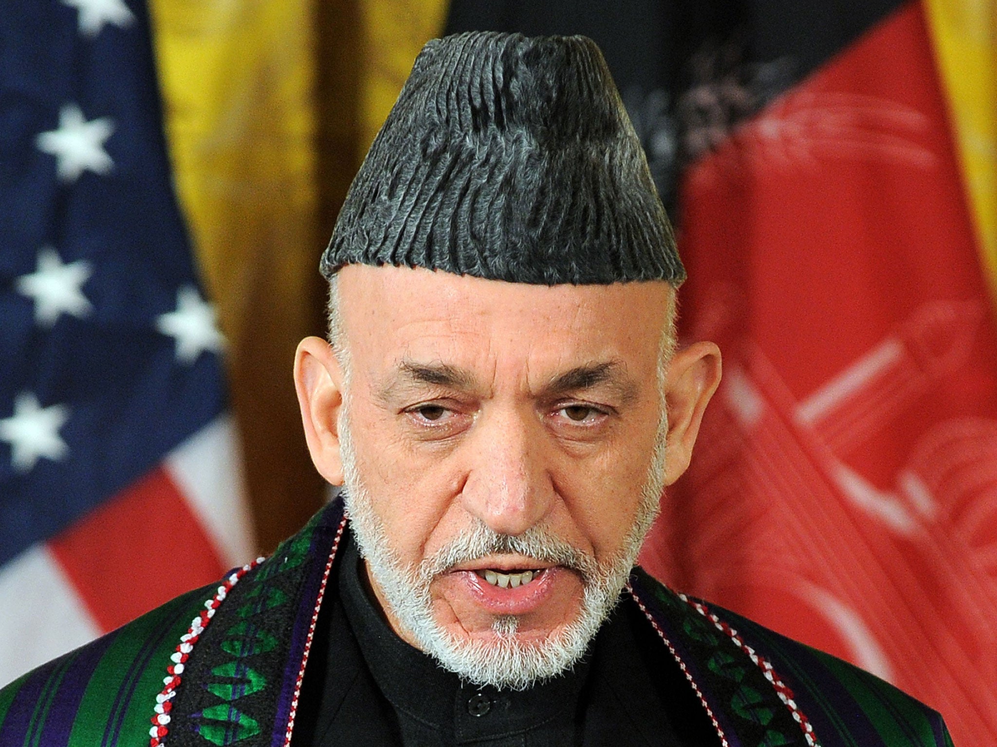 Afghan President Hamid Karzai has admitted that his national security team has been receiving payments from the US government for the past 10 years
