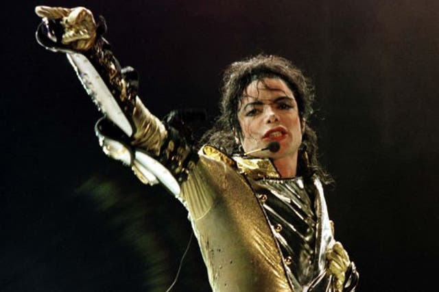<p>Michael Jackson performing during his HIStory World Tour</p>