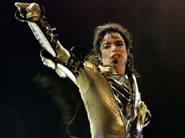 <p>Michael Jackson performing during his HIStory World Tour</p>