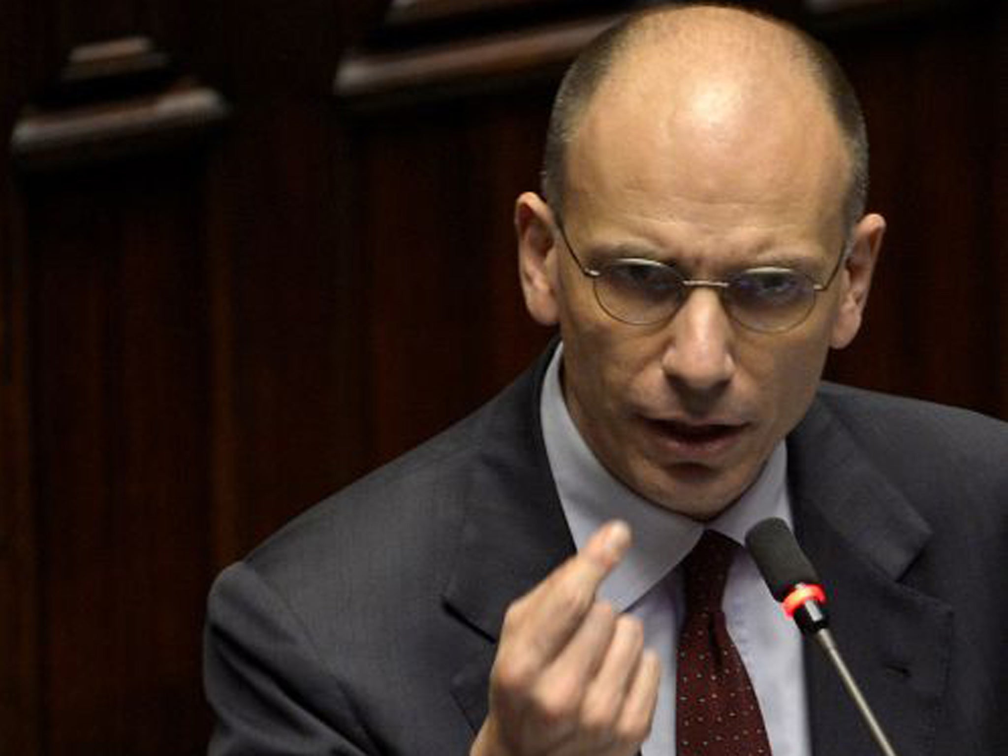 Enrico Letta has said his coalition will ease up on austerity in order to drag the pivotal eurozone economy out of its downward spiral