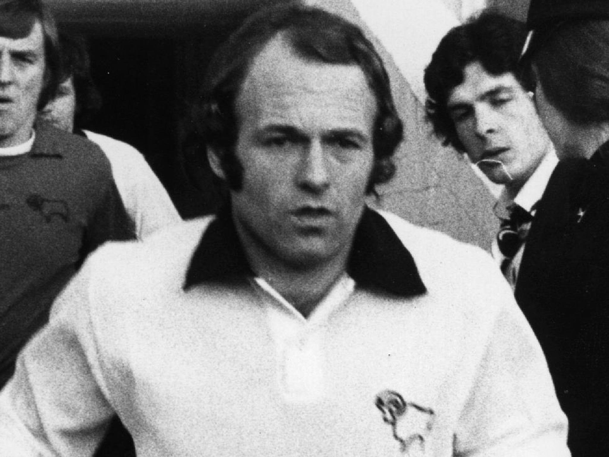 Scottish international footballer Archie Gemmill runs out on to the pitch before a match for Derby County