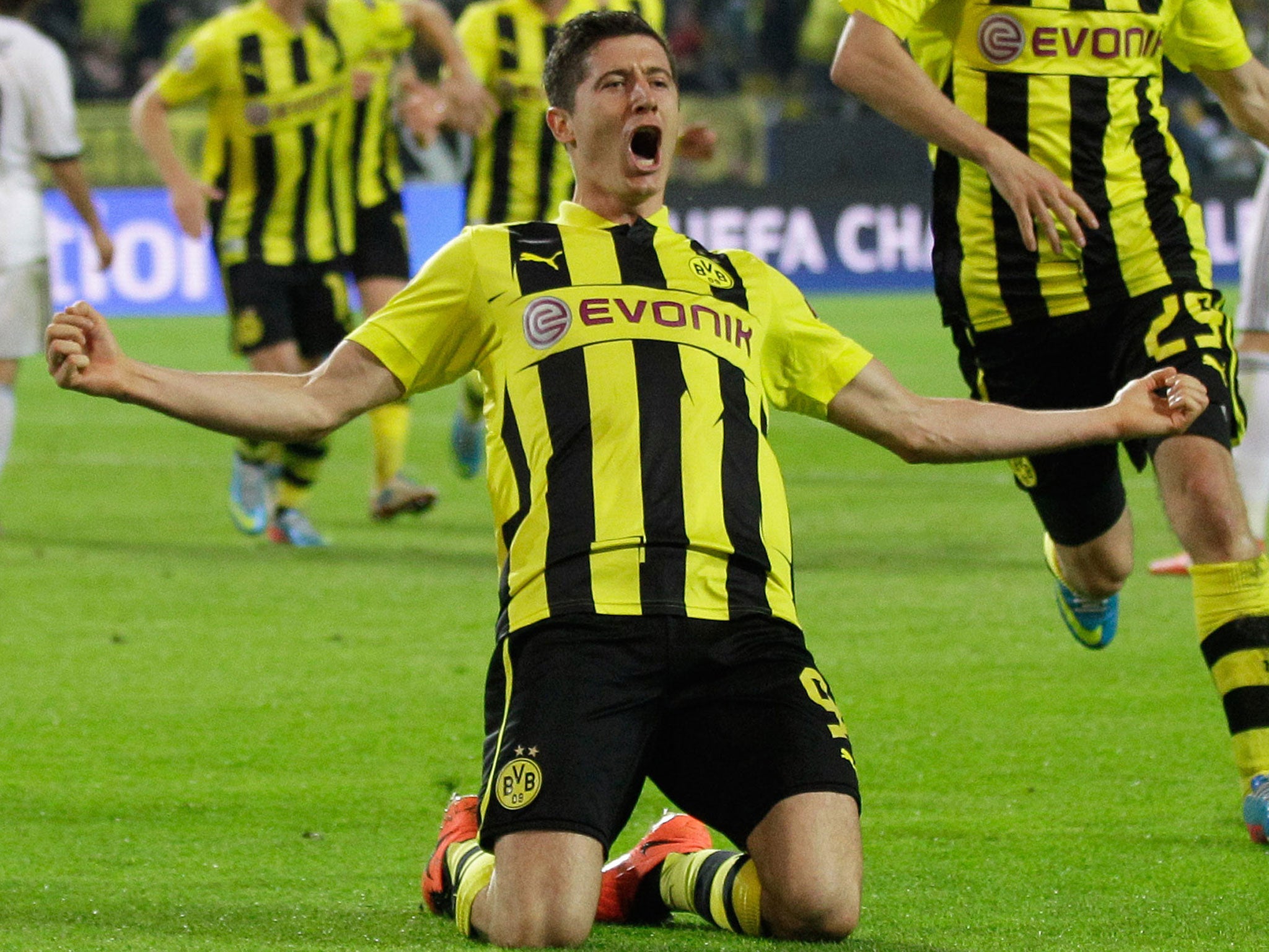 Dortmund’s Robert Lewandowski celebrates after scoring against Real Madrid