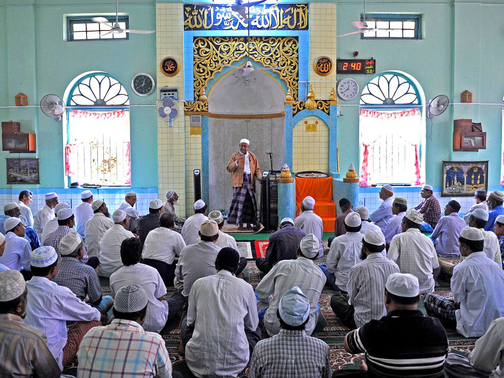 A prayer service at a mosque in Yangon, Burma