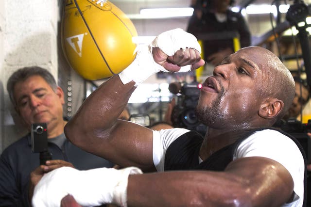 Floyd Mayweather training in Las Vegas last month. His new six-fight deal could take his career earnings past $1bn